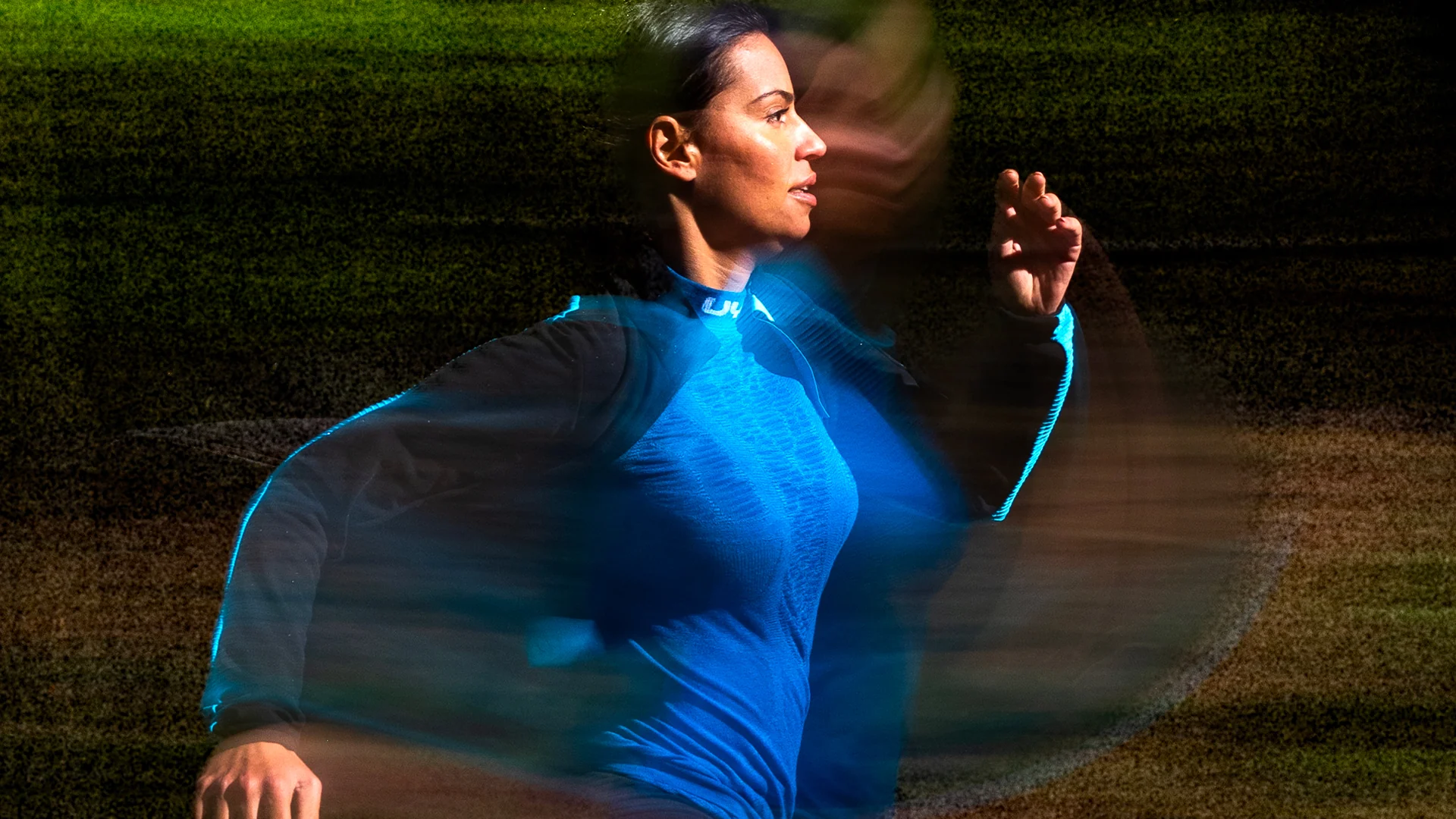 Runner in blue captured in an expressive motion study