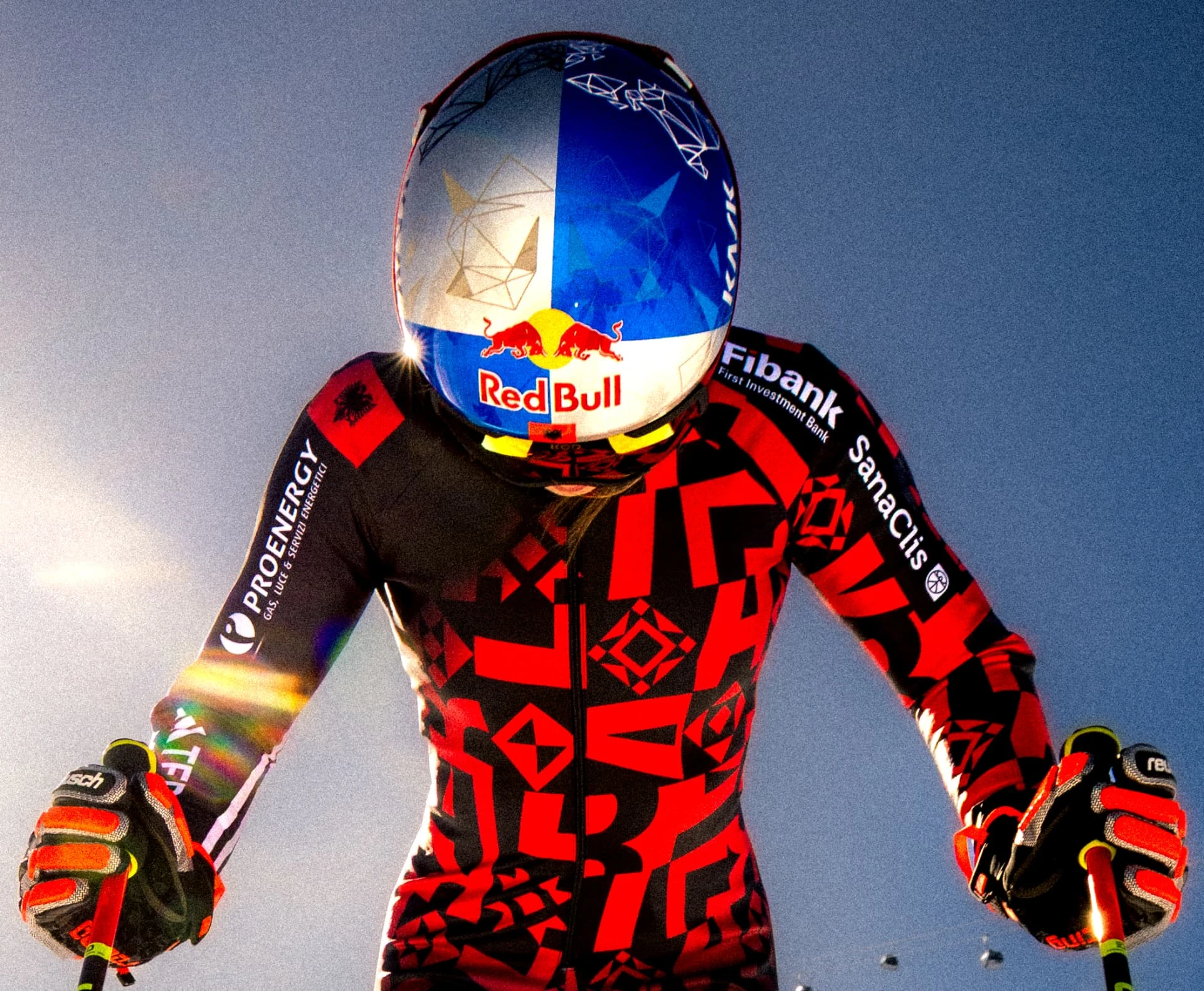 Detail of the Red Bull helmet and race suit backlit
