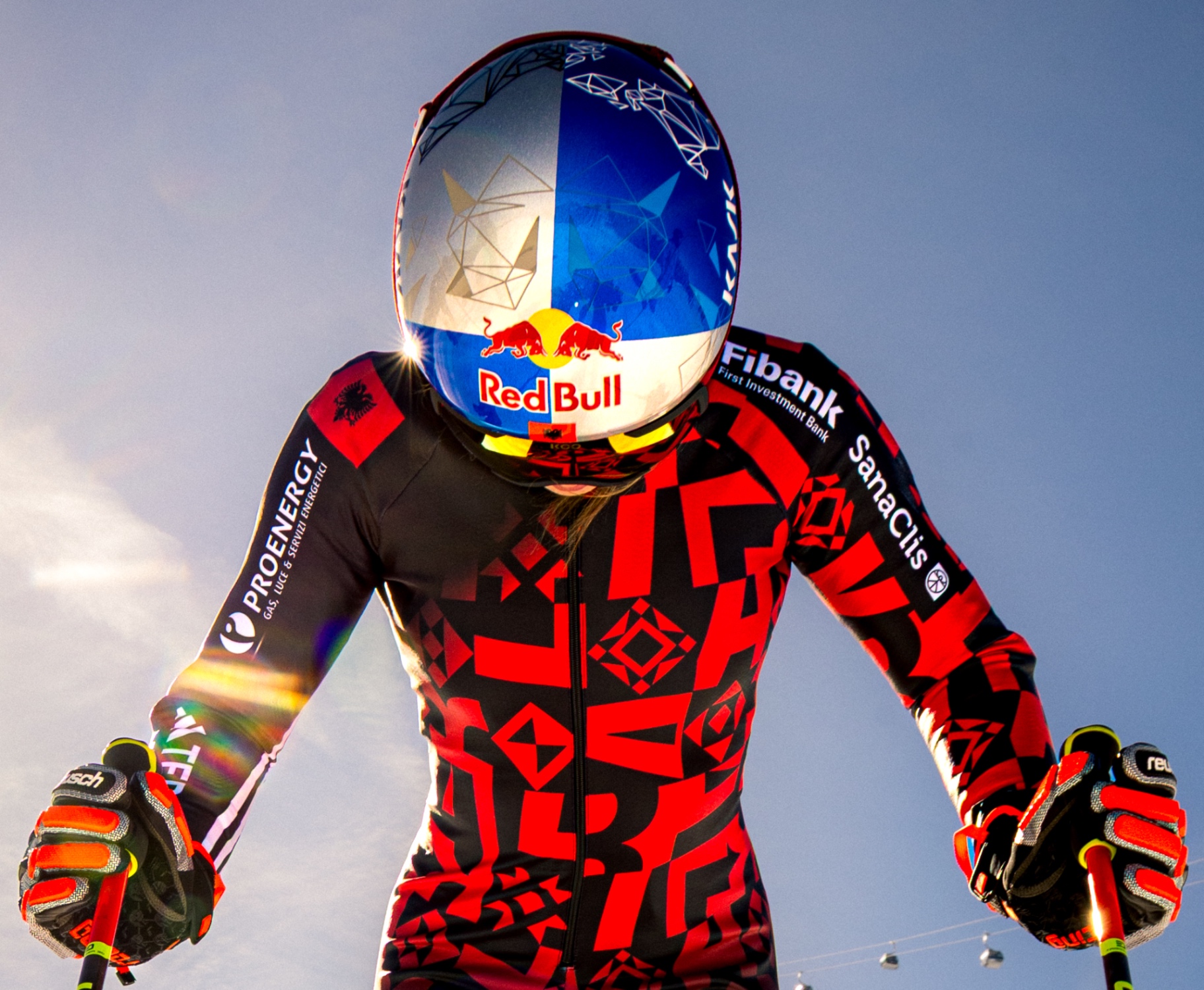 Detail of the Red Bull helmet and race suit backlit